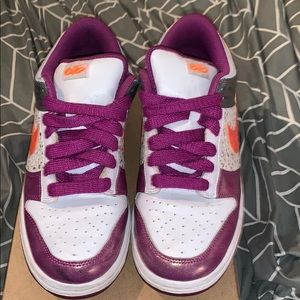 Purple and orange Nike sneakers